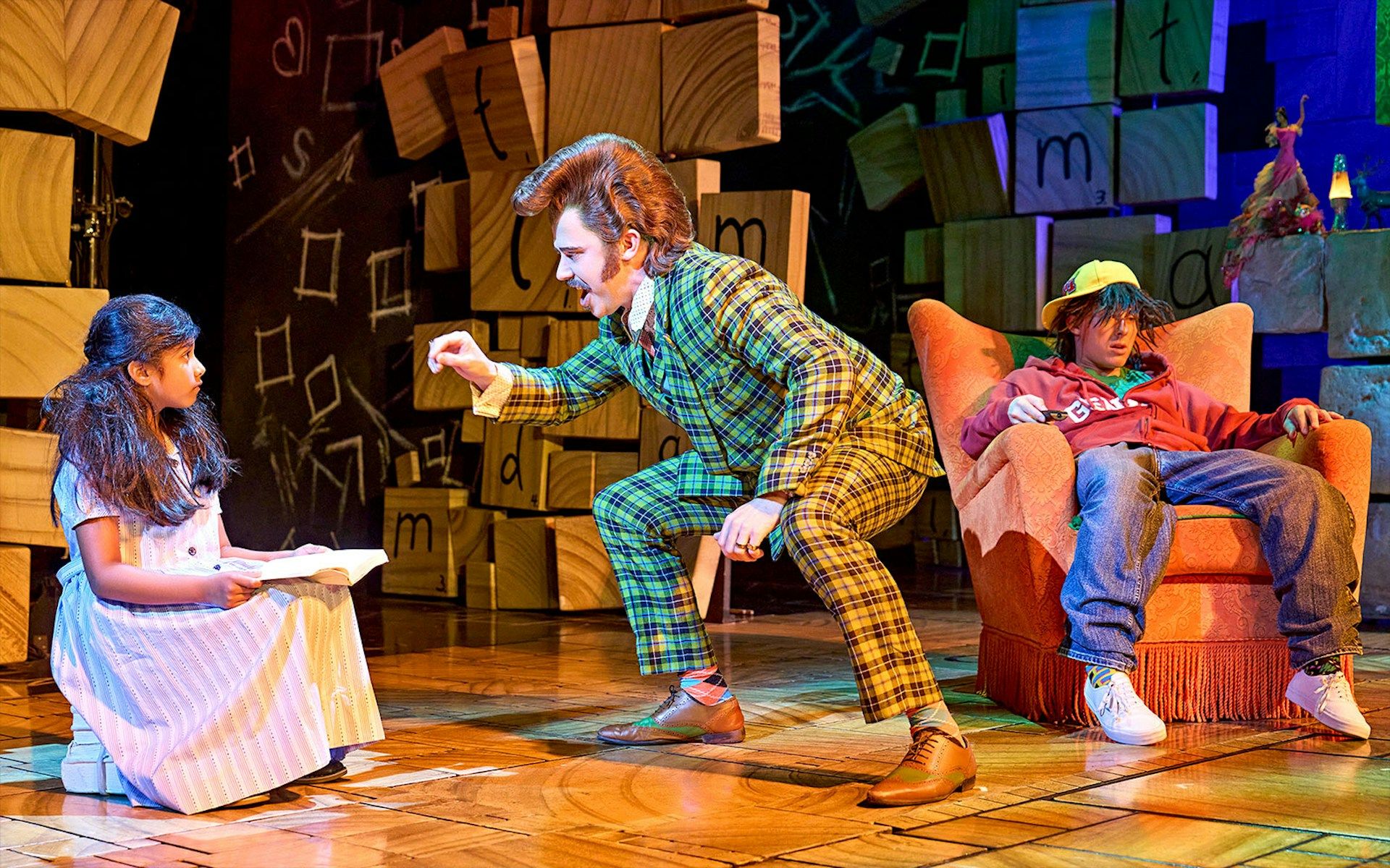 Matilda The Musical scene with characters interacting on stage
