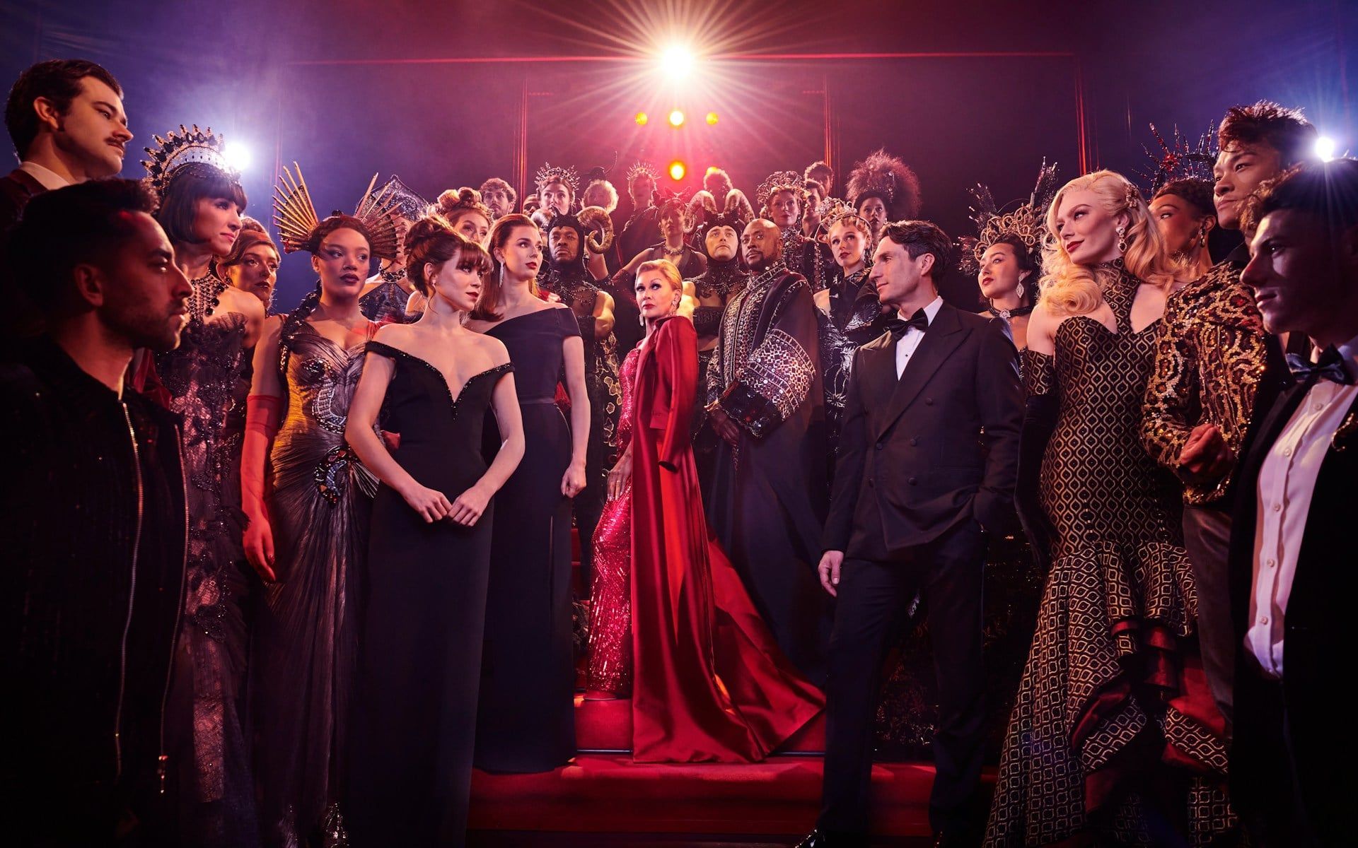 Stage performance of The Devil Wears Prada West End show with cast in elaborate costumes