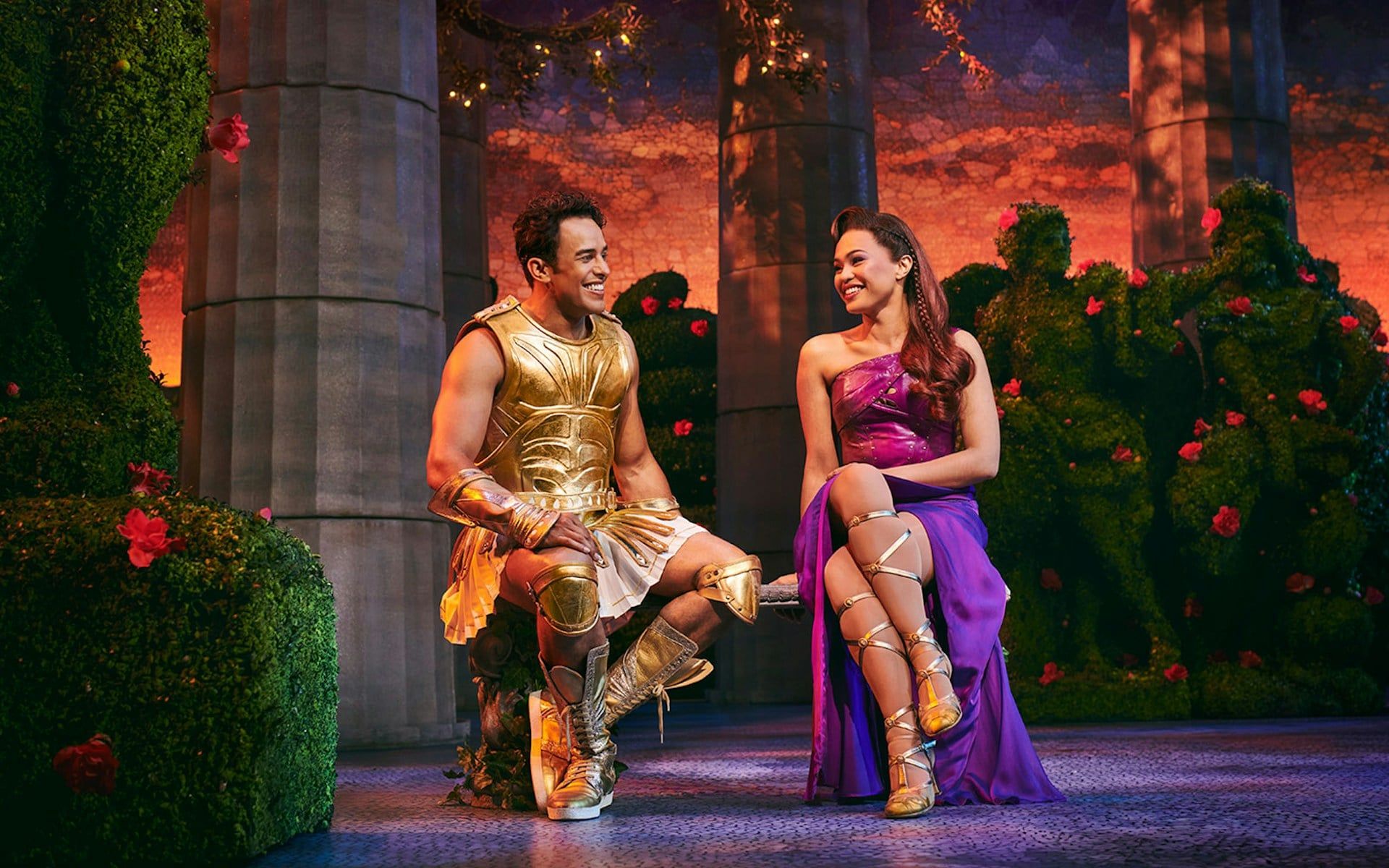 Hercules and Megara in costume during Disney's Hercules stage performance