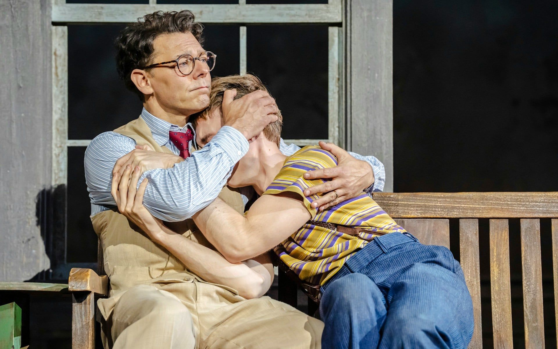 Actors embrace on stage during "To Kill a Mockingbird" West End show