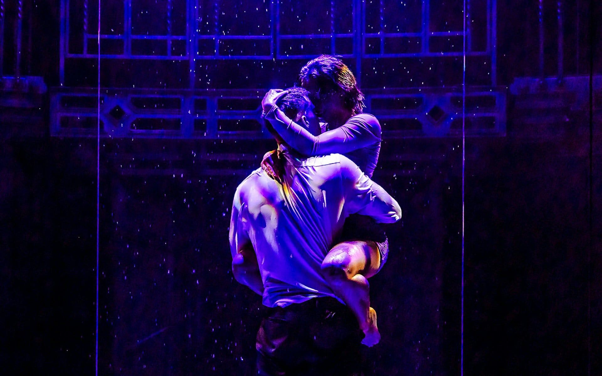 Performers in an embrace during Magic Mike Live show