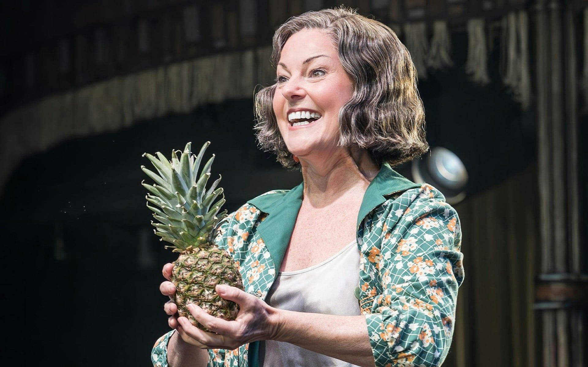 Performer holding a pineapple during Cabaret Westend show