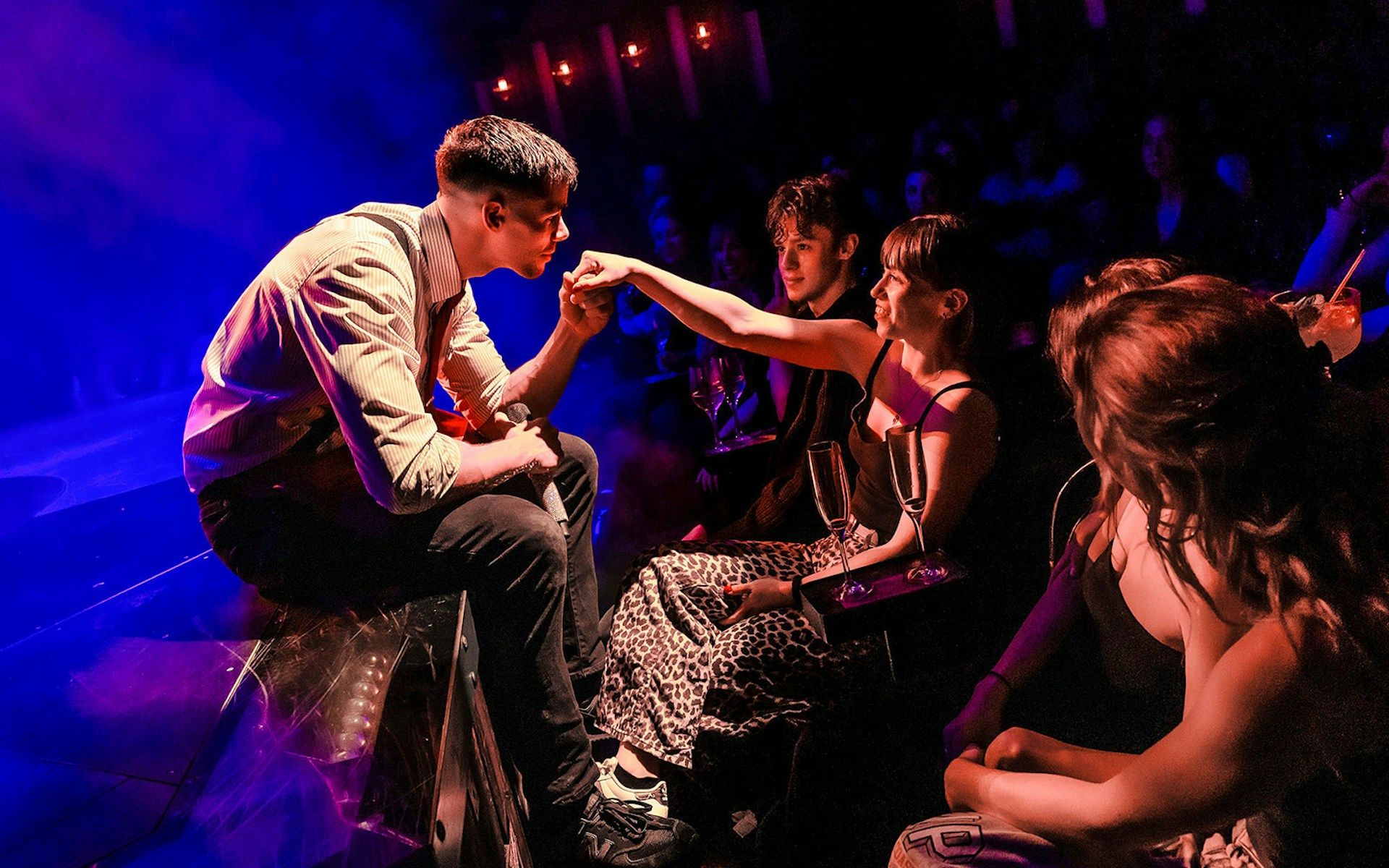 Performer interacting with audience at Magic Mike Live show