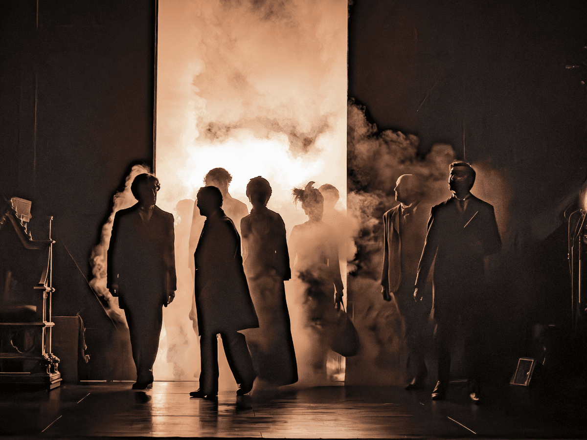 Performers emerging through smoke in Grace Pervades West End show