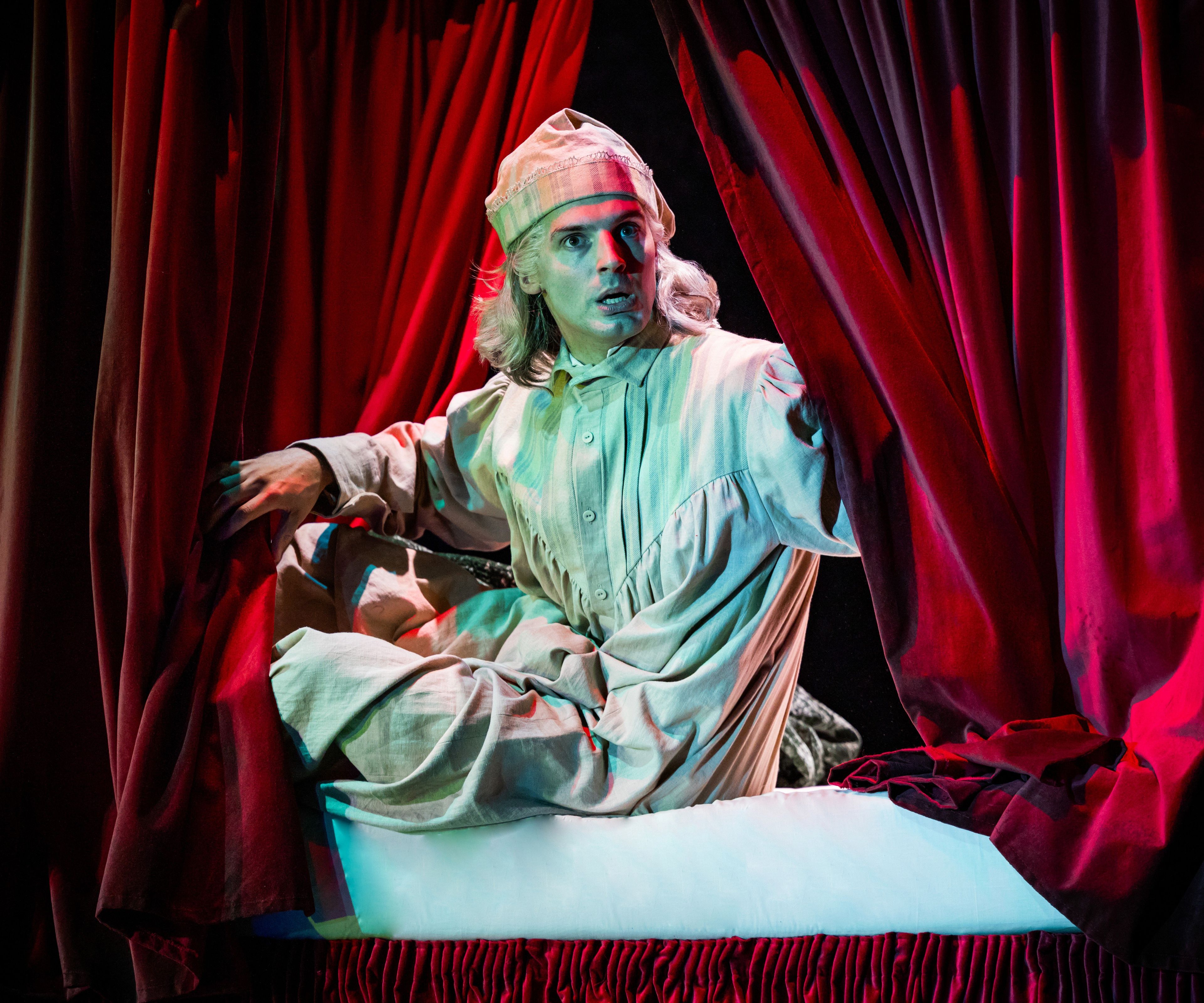 Production photograph from Christmas Carol Goes Wrong