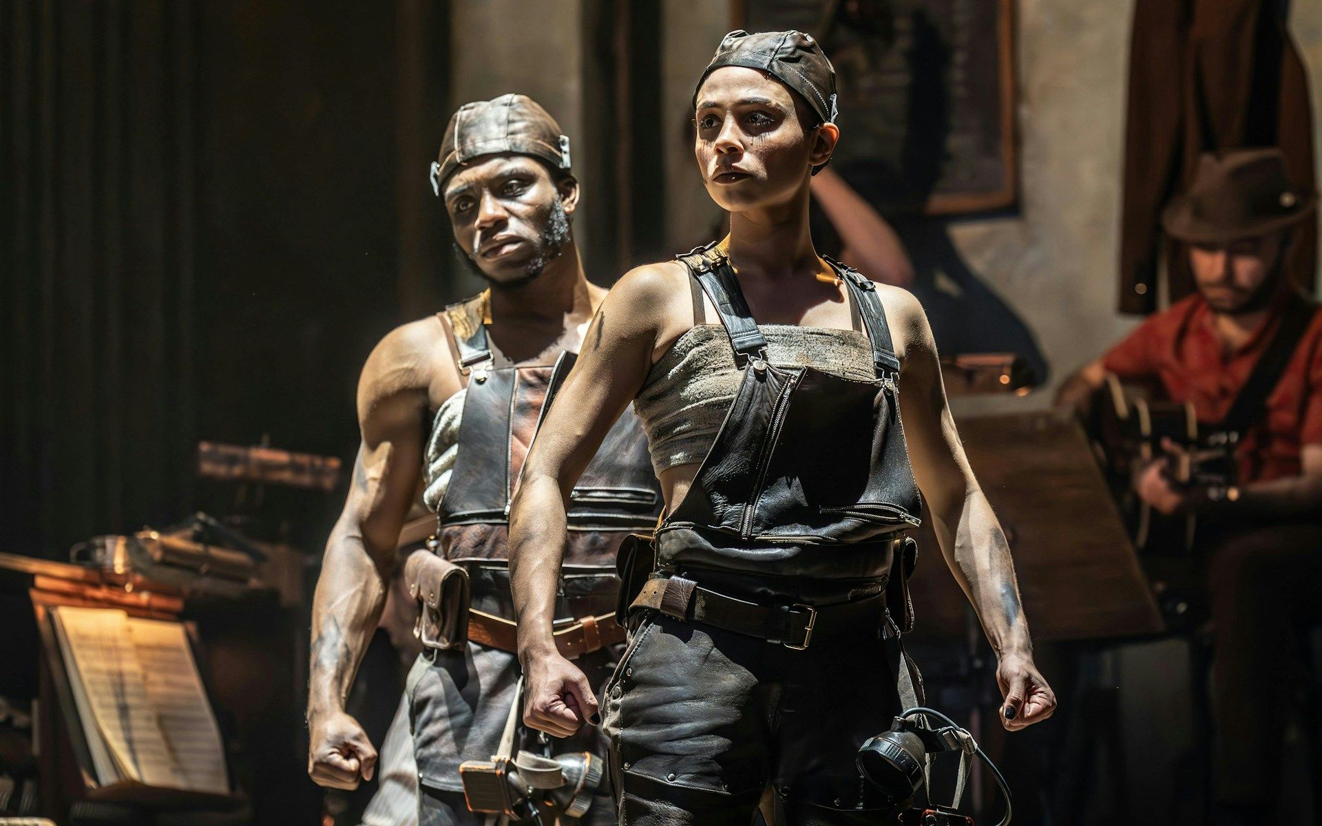Performers in Hadestown musical on West End stage