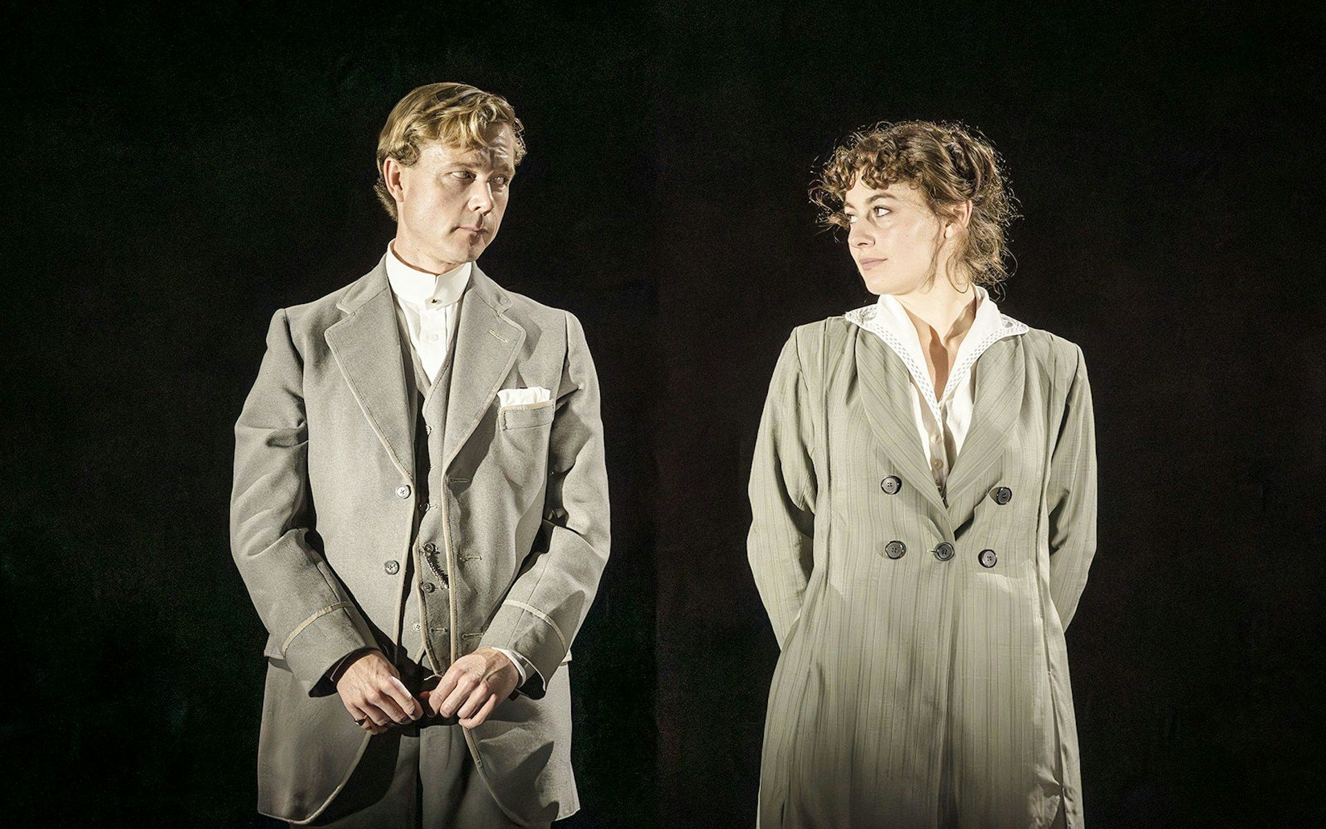 Performers in period costumes on stage in Grace Pervades West End show