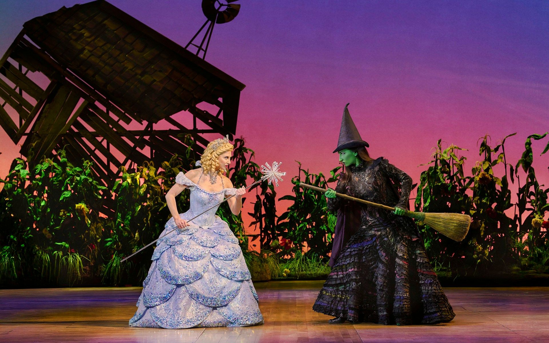 Two lead characters on stage in Wicked, Apollo Victoria Theatre