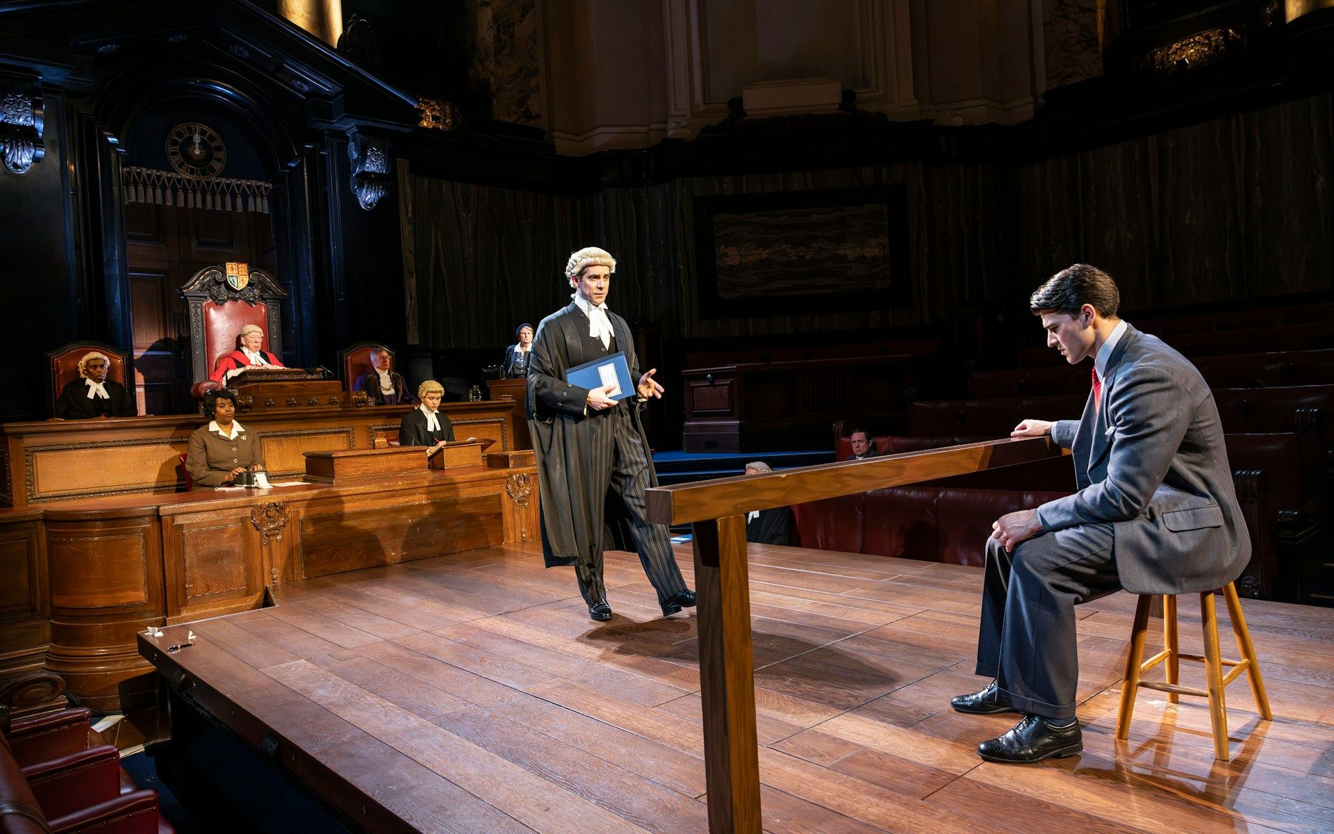 Courtroom scene from "Witness for the Prosecution" performance with actors in legal roles