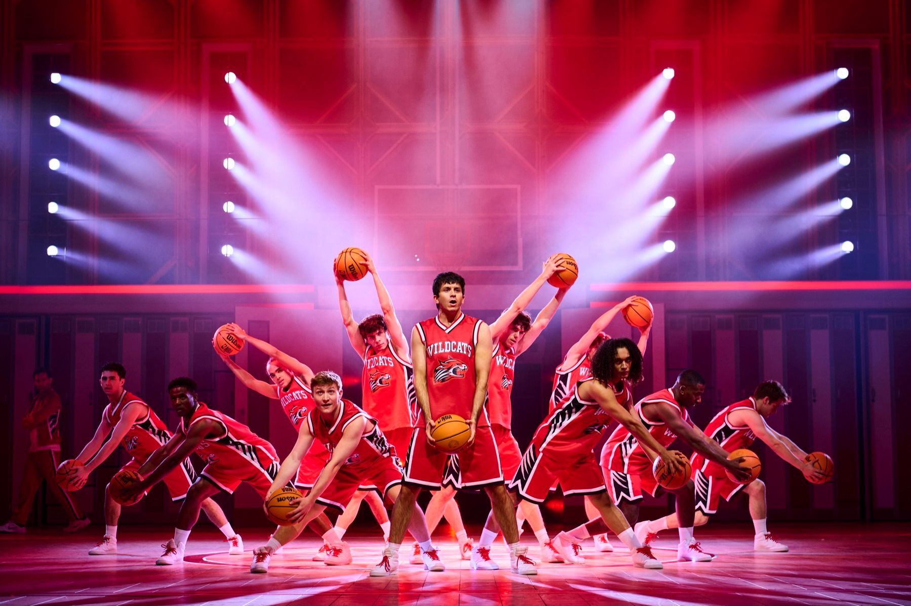 Tobias Turley as Troy Bolton and the company in High School Musical (photo: Matt Crockett)