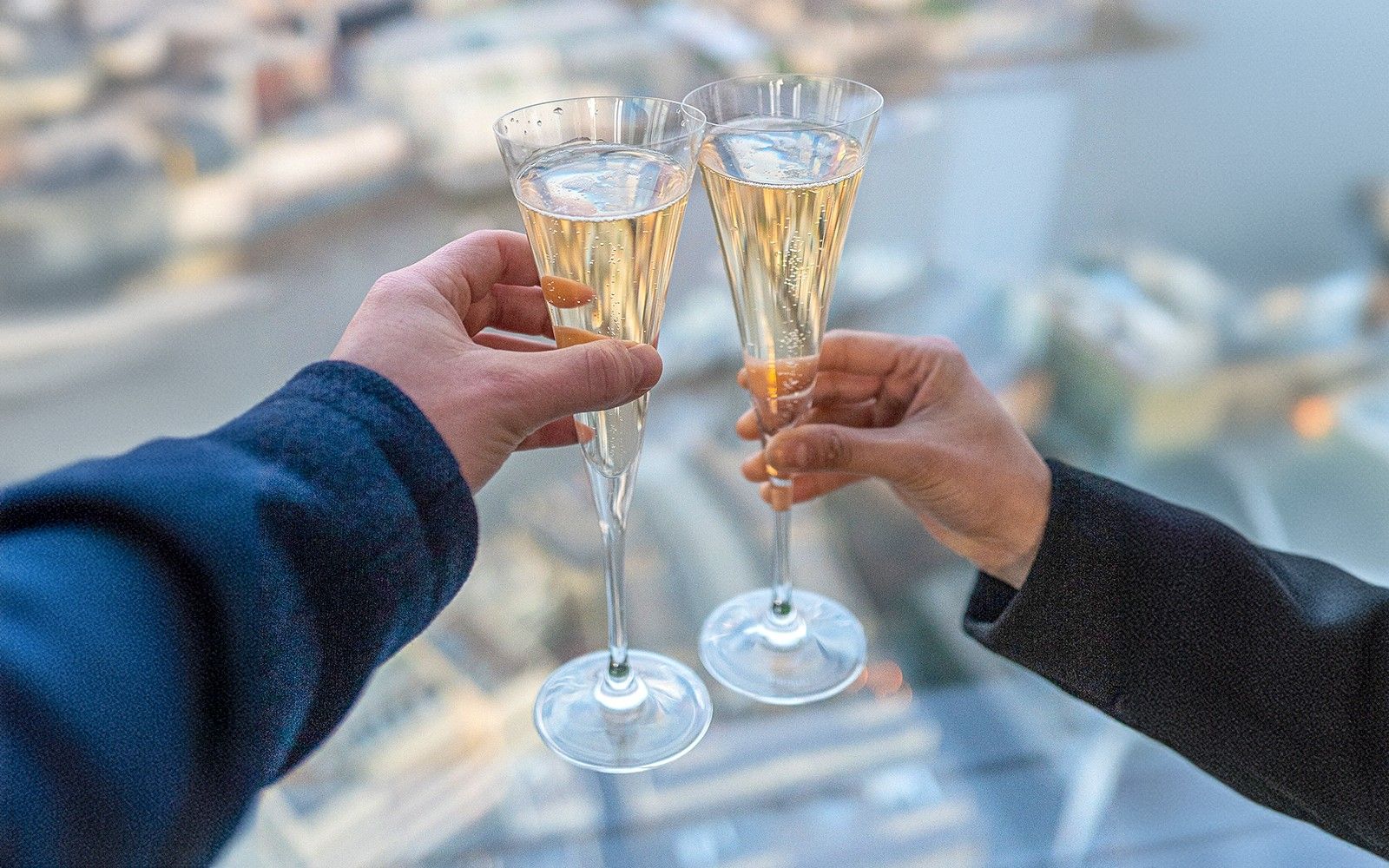 View from The Shard with champagne, London skyline, Combo: The View from The Shard + Up At The O2 Tickets.