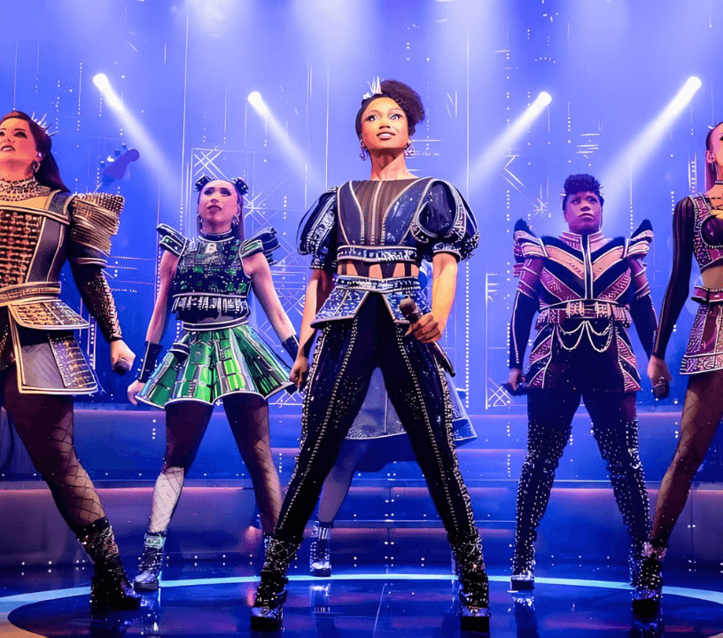 SIX The Musical ensemble cast performing a showstopping musical number